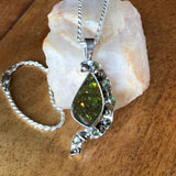 Ancient Ammolite Pendent With 6 Citrines In Silver and Gold Setting